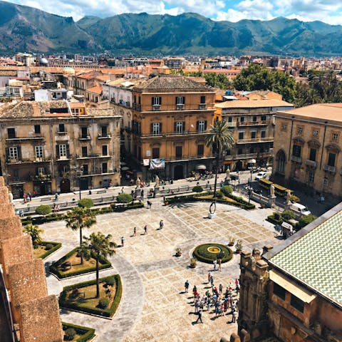 Plan a day trip to the bustling city of Palermo