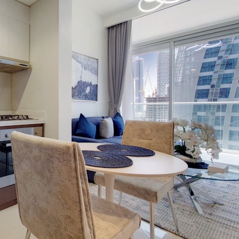 Enjoy some chebabs (Emirati-style pancakes) at the dining table