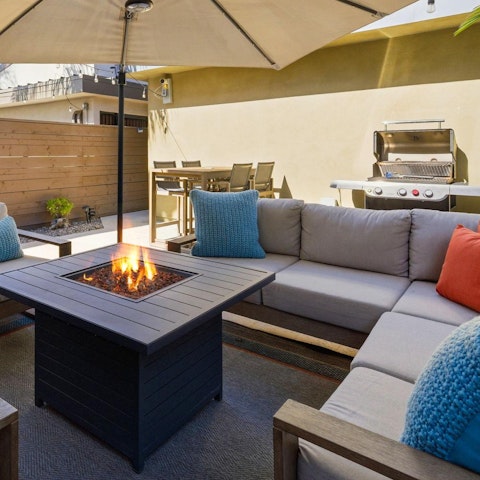 Spend evenings around the private fire pit and barbecue on the patio