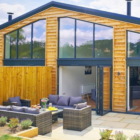 Enjoy a charcuterie board around the outdoor table