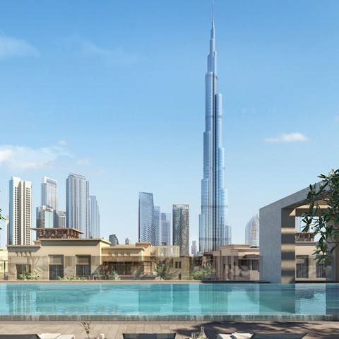 Swim in the communal pool, surrounded by skyscrapers