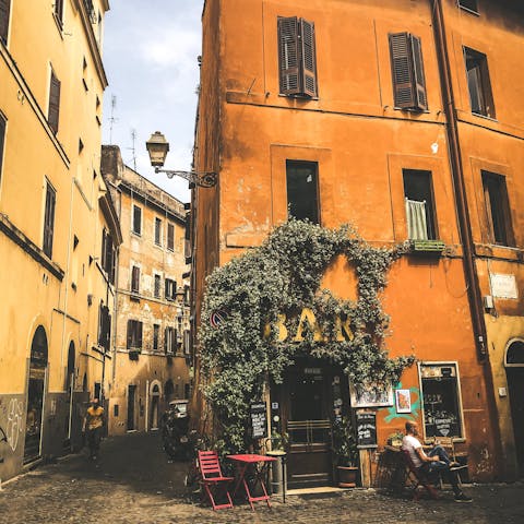 Explore Trastevere's craft beer pubs, laidback eateries and artisan shops