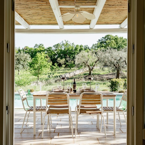 Soak in the  olive groves vistas over a lazy alfresco lunch