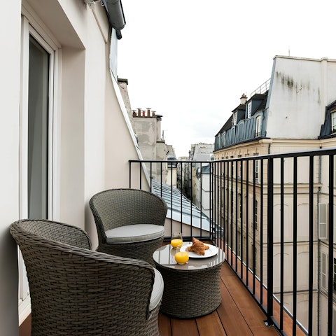 Enjoy a croissant and a coffee alfresco on the balcony