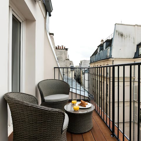 Enjoy a croissant and a coffee alfresco on the balcony