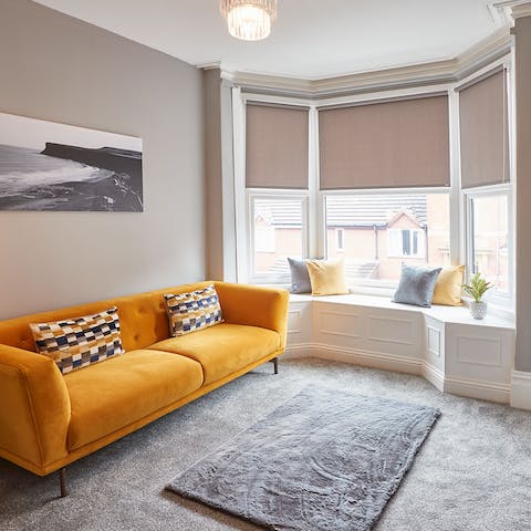 Take a seat in the bay window and read a book