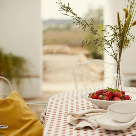 Tuck into alfresco feasts of local food on one of the garden terraces