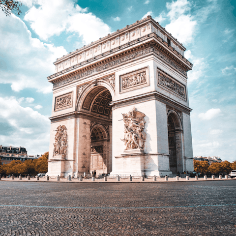 Stroll to the end of the Champs-Élysées to marvel at the Arc de Triomphe