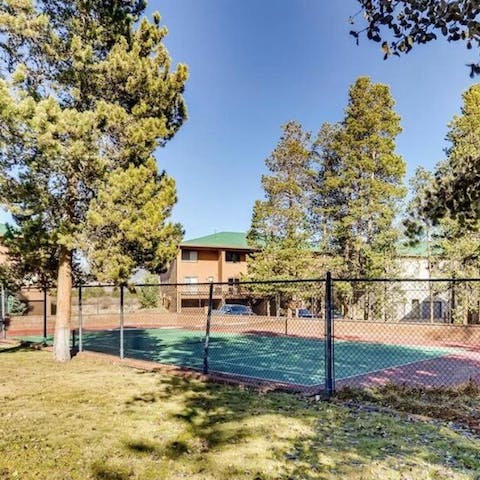 Enjoy playing a match of tennis in the summer months