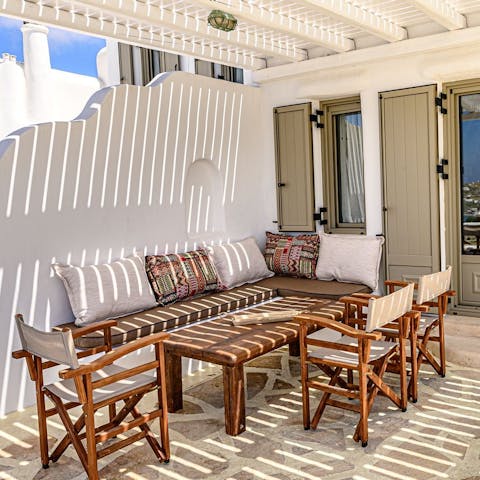 Gather under the dining pergola for an alfresco feast