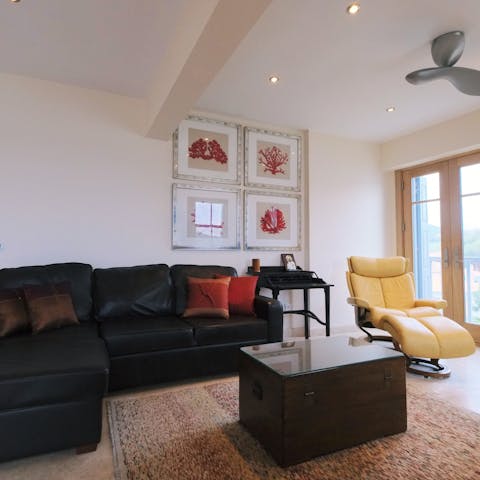 Stretch out on the plump leather chairs with your holiday read