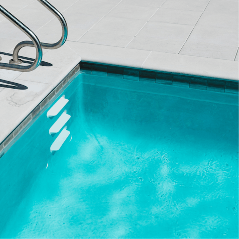 Take a refreshing dip in the communal pool