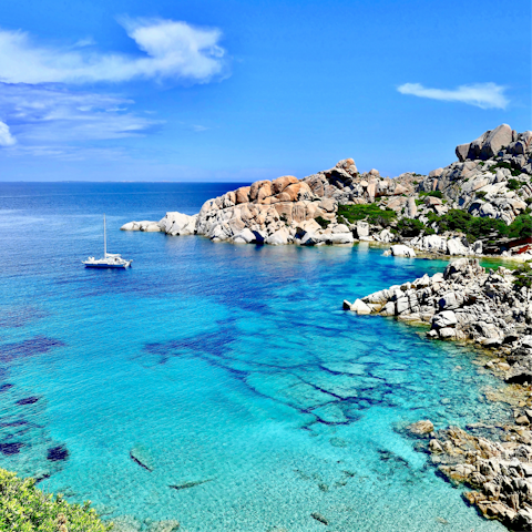 Explore the rugged coastlines of Sardinia by car, with the northern tip some eighty minutes away