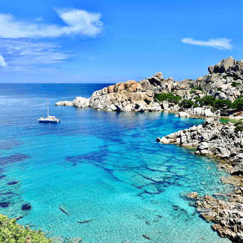 Explore the rugged coastlines of Sardinia by car, with the northern tip some eighty minutes away
