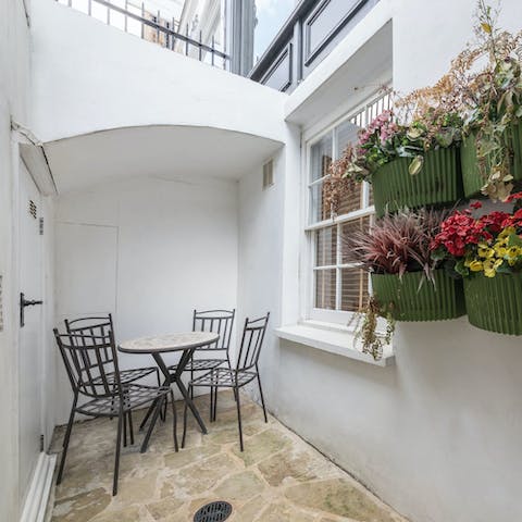 Enjoy a glass of wine out on the private terrace before heading out for dinner