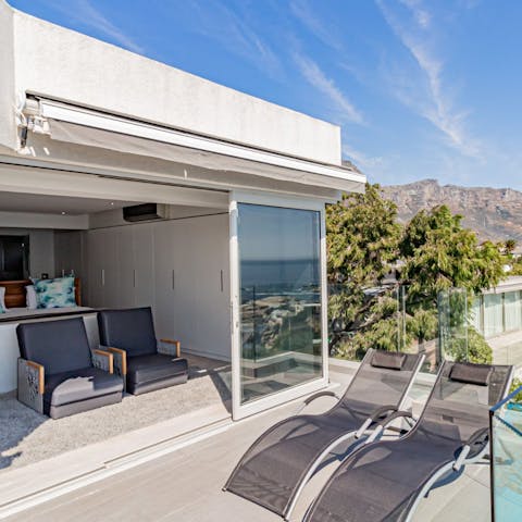 Slide open the doors to master bedroom's amazing balcony