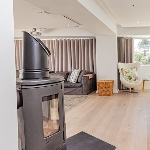 Light the modern gas fire on cooler winter days