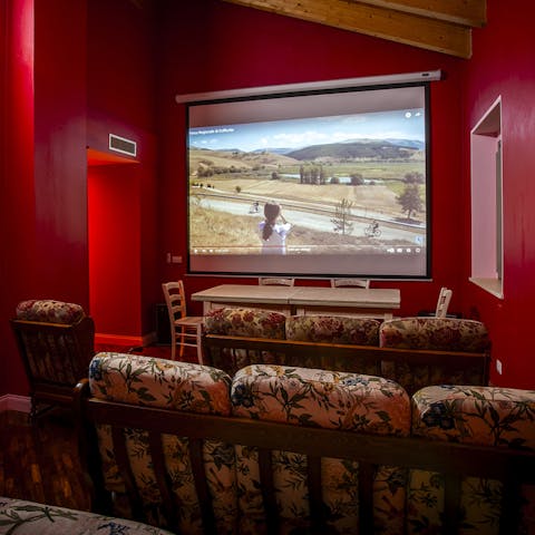Watch a film in the cinema room