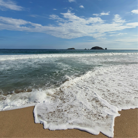 Sink your toes in the sand at nearby Plava beach