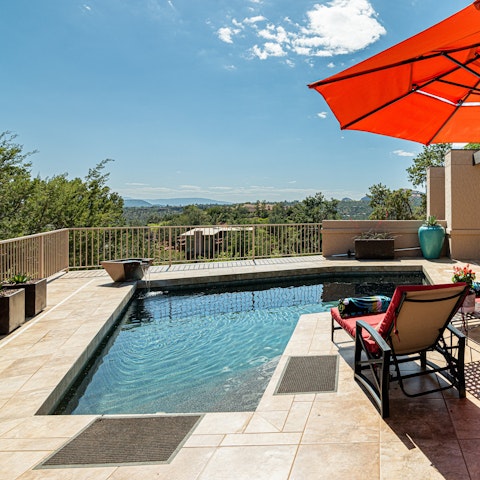 Admire the view as you relax by the private pool