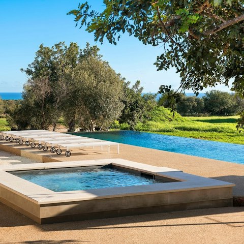 Find peace and relaxation while lounging by the pool