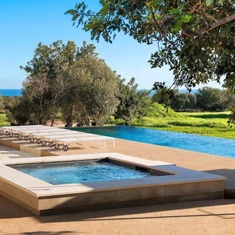 Find peace and relaxation while lounging by the pool