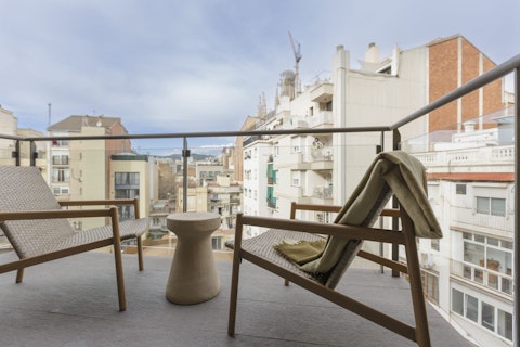 Stretch out above the Barcelona rooftops with a drink