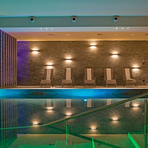Relax on a poolside lounger after swimming a few lengths