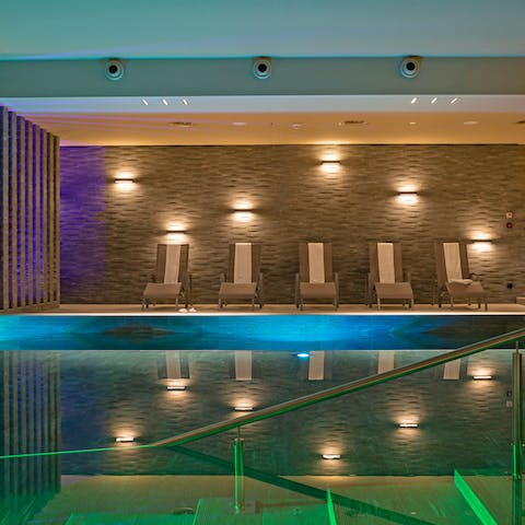 Relax on a poolside lounger after swimming a few lengths