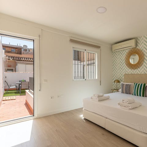 Allow plenty of sunlight into the bedroom with the French door