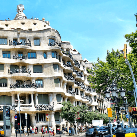 Admire the architecture on Passeig de Gràcia – a fourteen–minute walk away