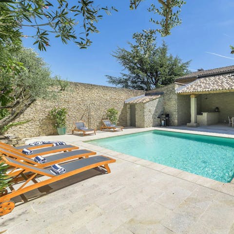 Soak up the sun beside the private pool