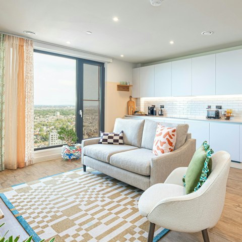 Curl up with coffees and drink in the city views
