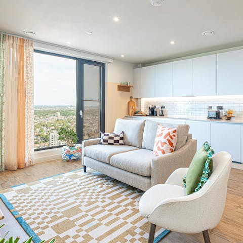Curl up with coffees and drink in the city views