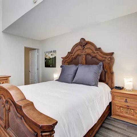 Sleep sound in big beds with ornate headboards