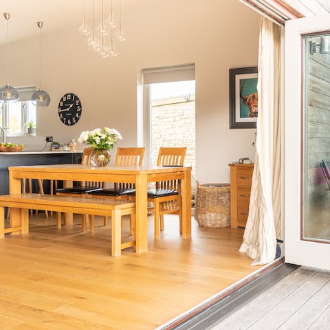 Open the bi-folding doors to bring the outdoors in