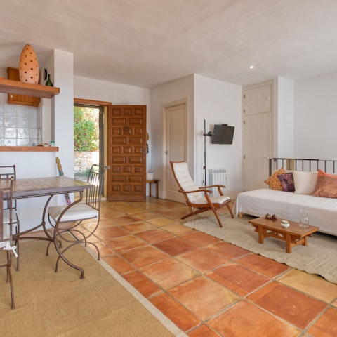 Get a taste of traditional Spanish design with the terracotta tiled floors