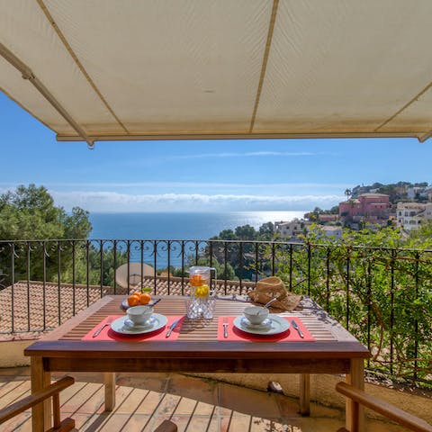 Sip your morning coffee on the balcony overlooking the sea