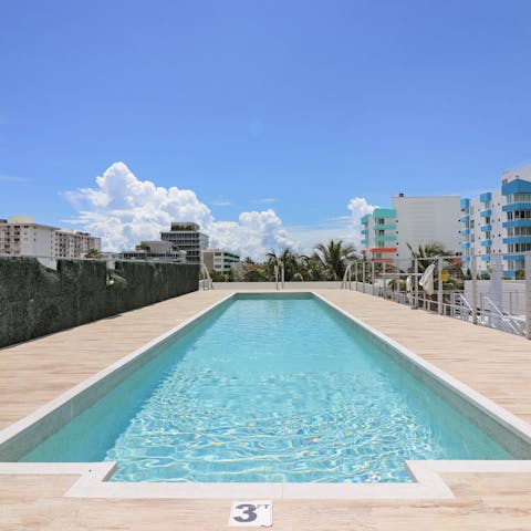 Top up your tan by the rooftop pool