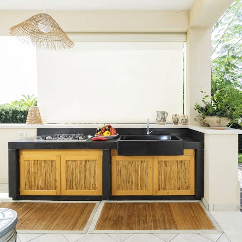 Cook up some pasta con le sarde for lunch in the outdoor kitchen