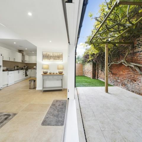 Slide open the patio doors and embrace indoor-outdoor living