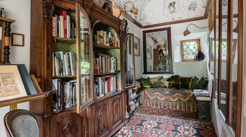 Pick a book off the shelf and curl up in the atmospheric library