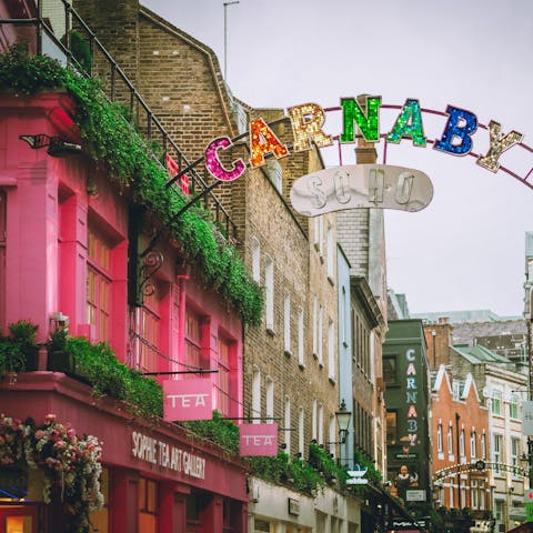Take to the boutiques and hip bars of Soho's Carnaby Street, a nine-minute walk away