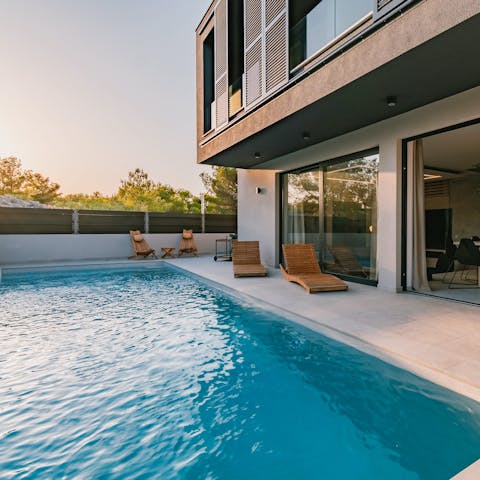 Take in the Croatian sun by the pool