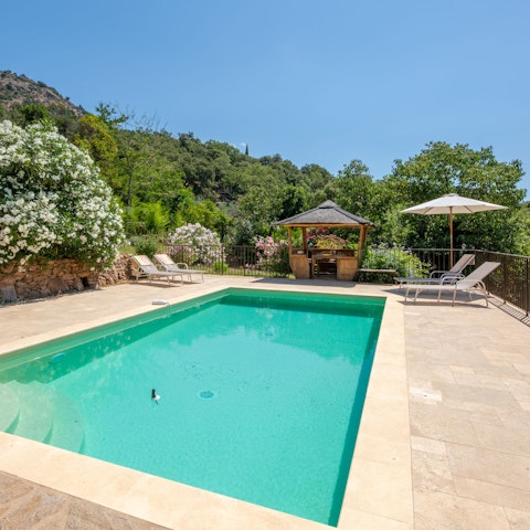 Find peace and relaxation while lounging by the pool