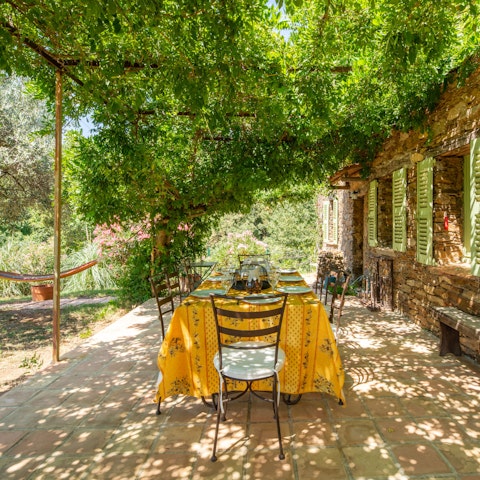 Savour delicious local wine served on the terrace