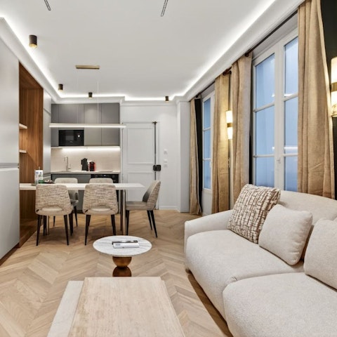 Relax with a glass of French wine in the living room