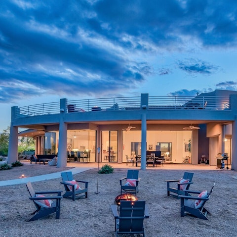 Gather around the glow of the fire pit with drinks