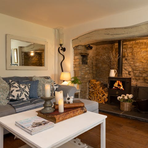 Rest weary legs by the fire in the traditional living room