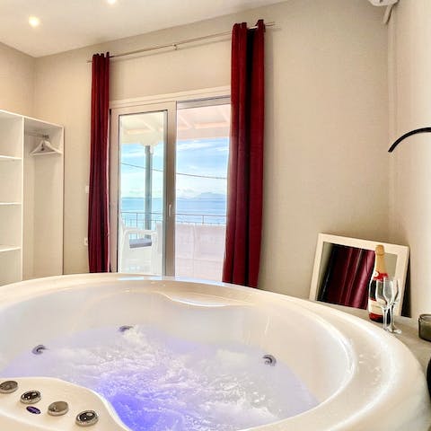 Indulge in a luxurious soak in the private Jacuzzi
